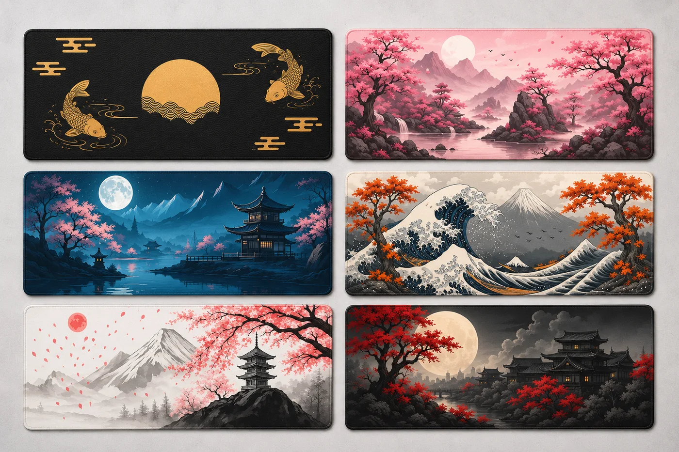 Six Japanese collection desk mats laid out flat side by side: gold koi around a gold moon on black, pink cherry blossoms over a lake, a pagoda under a full moon in night blues, the Great Wave with Mount Fuji, an ink-wash Fuji with a pagoda and pink blossoms, and a temple under a full moon framed by red maple
